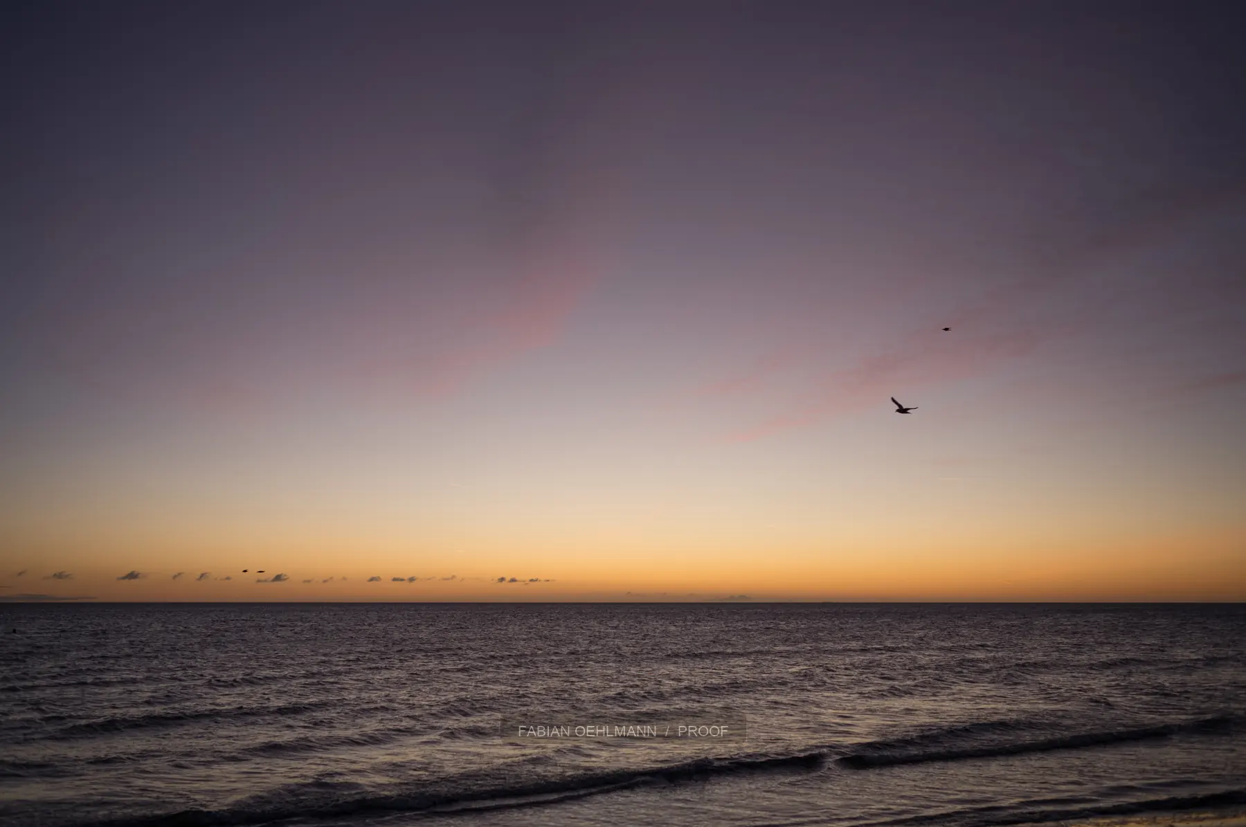 Minimal sunset over a calm sea